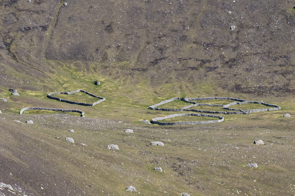 a winding road in the middle of a mountain