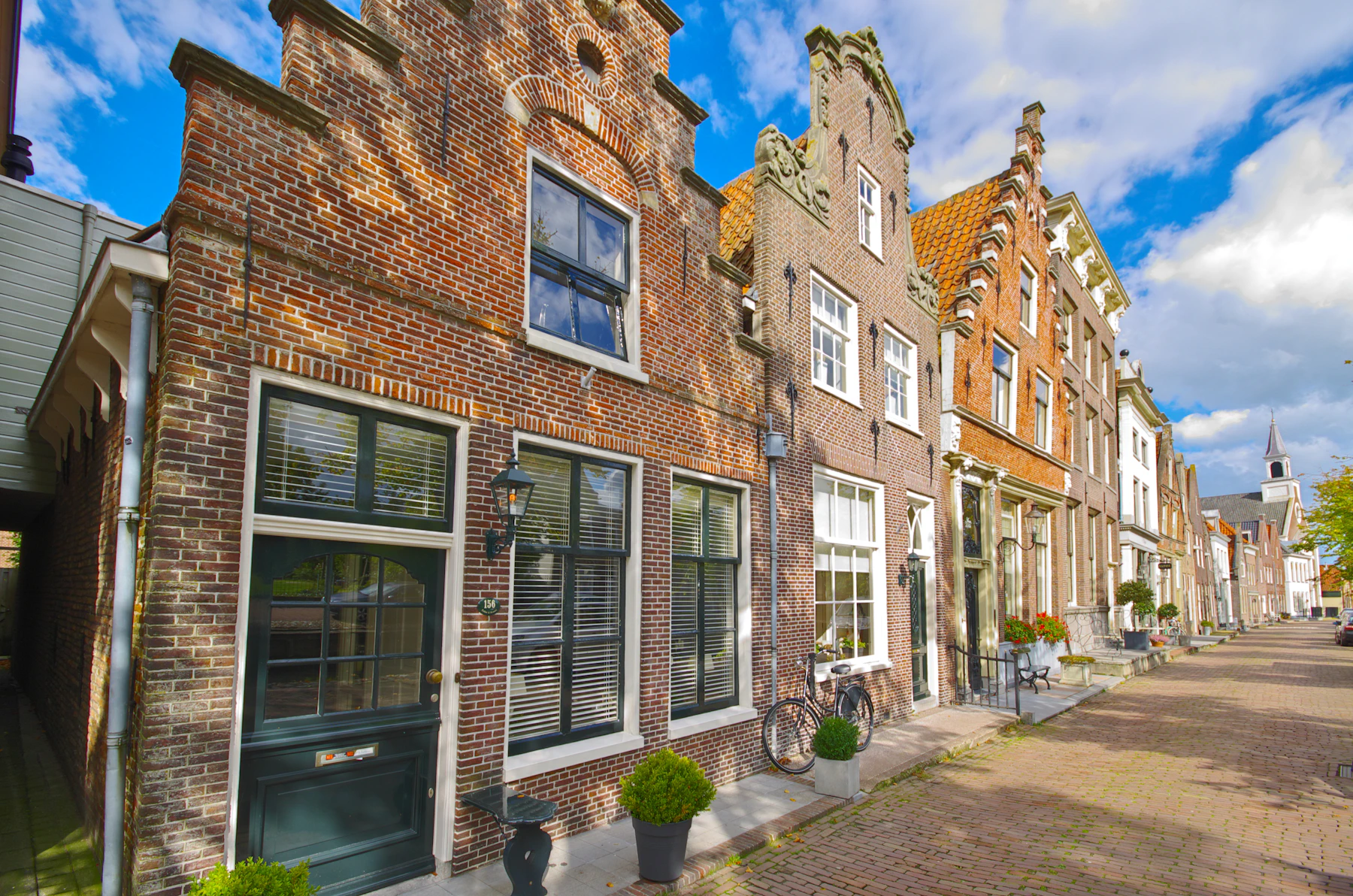 Row of old buildings on a cobbled street