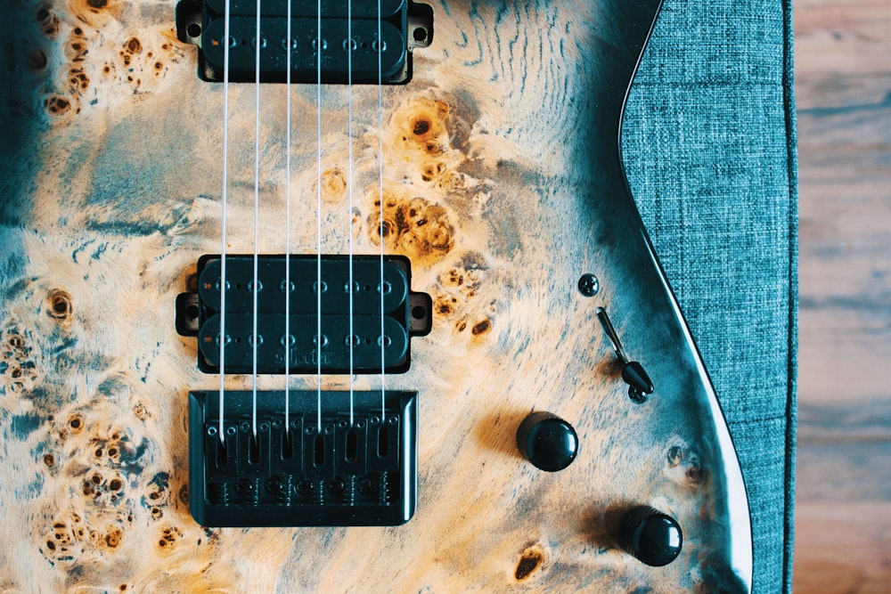 a close up of a guitar with a lot of rust on it