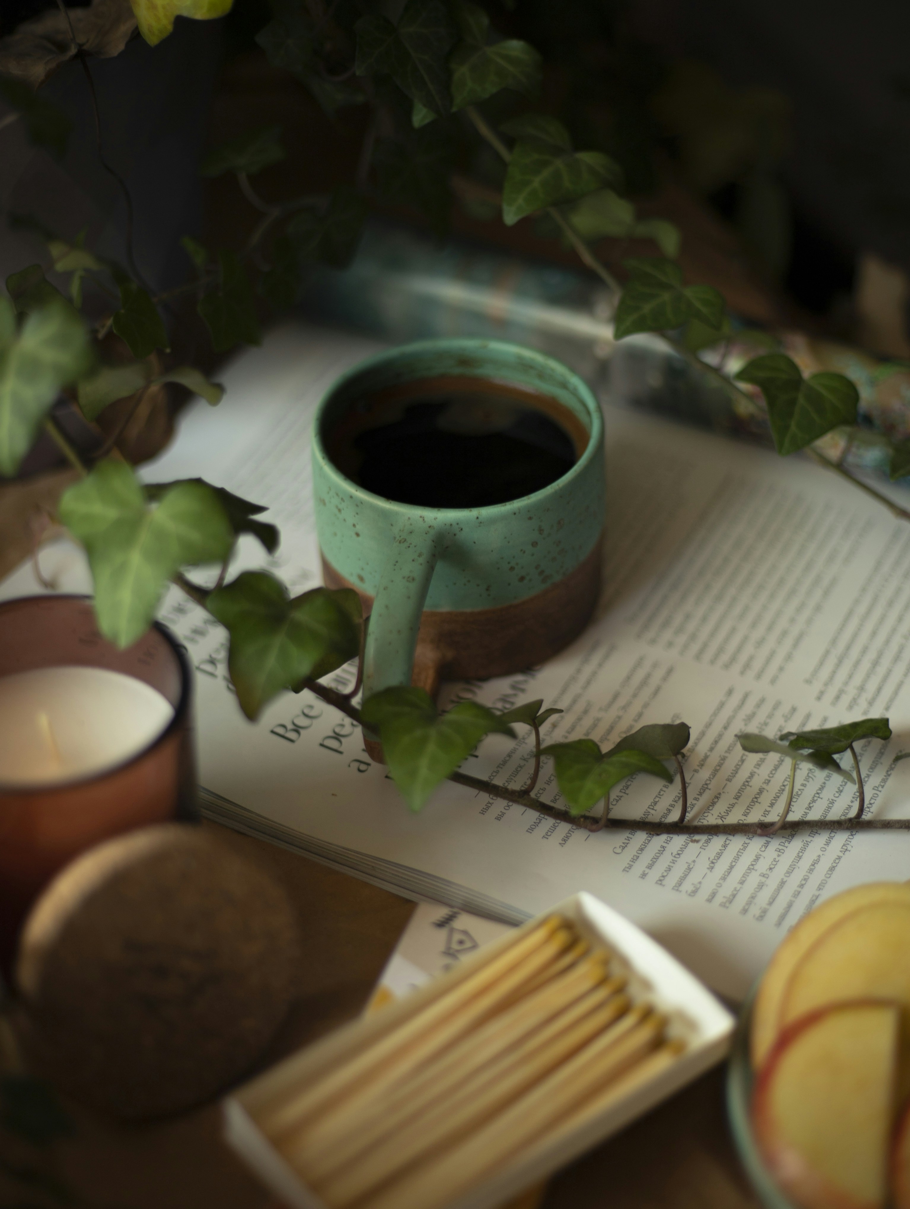 A cup of herbal tea with fresh herbs