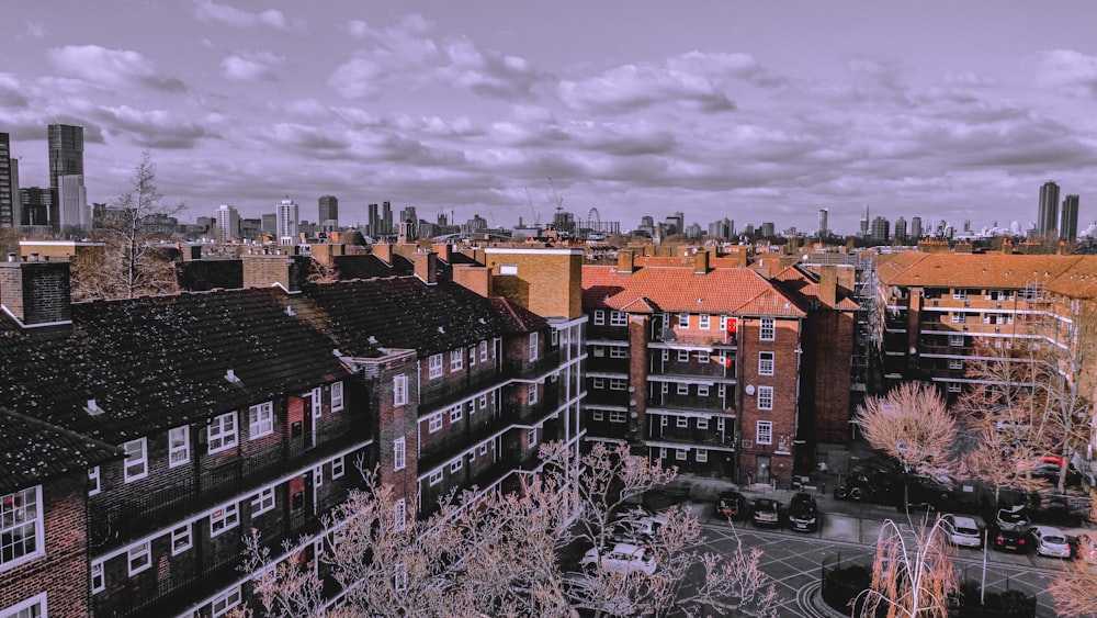 an aerial view of a city with tall buildings