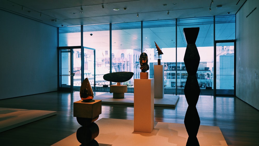 a room filled with different types of sculptures