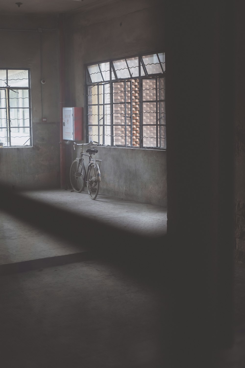 a bike is parked in an empty room