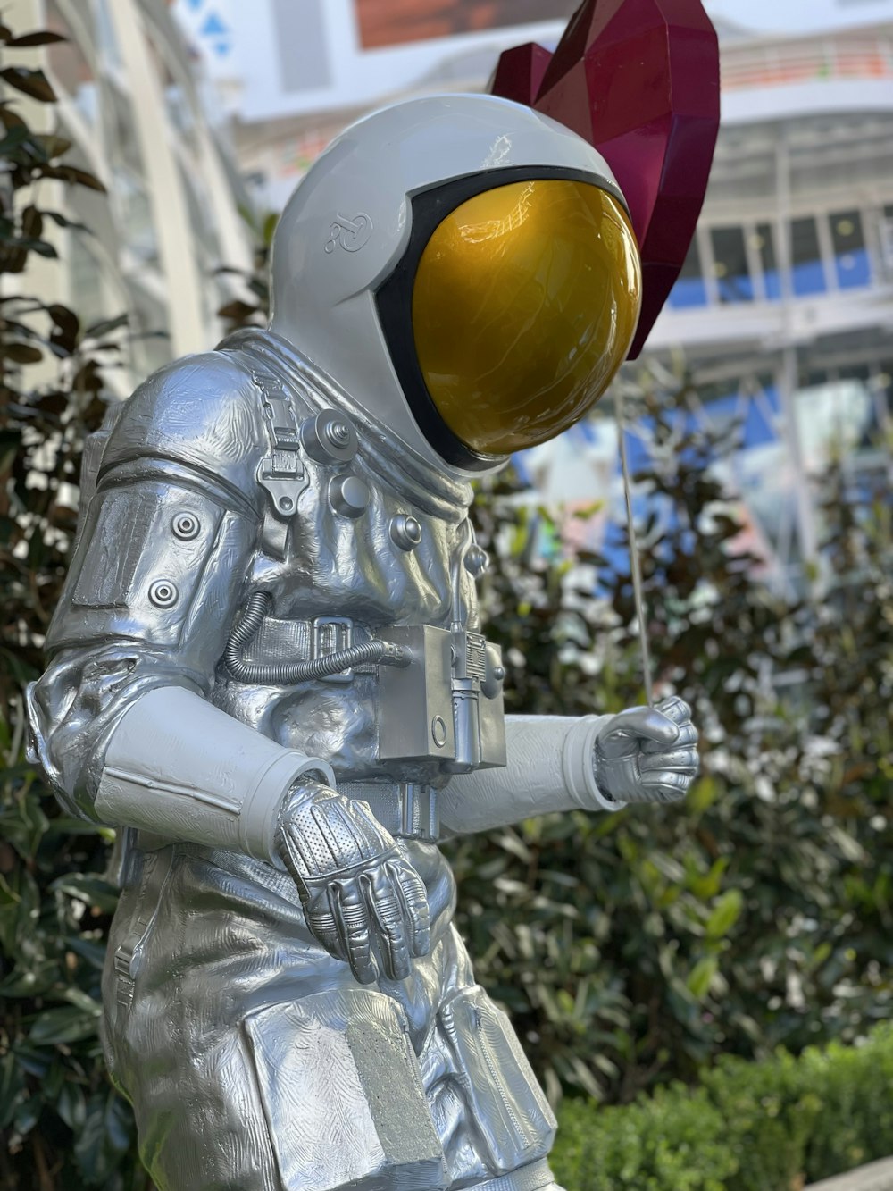 a statue of a man in a space suit