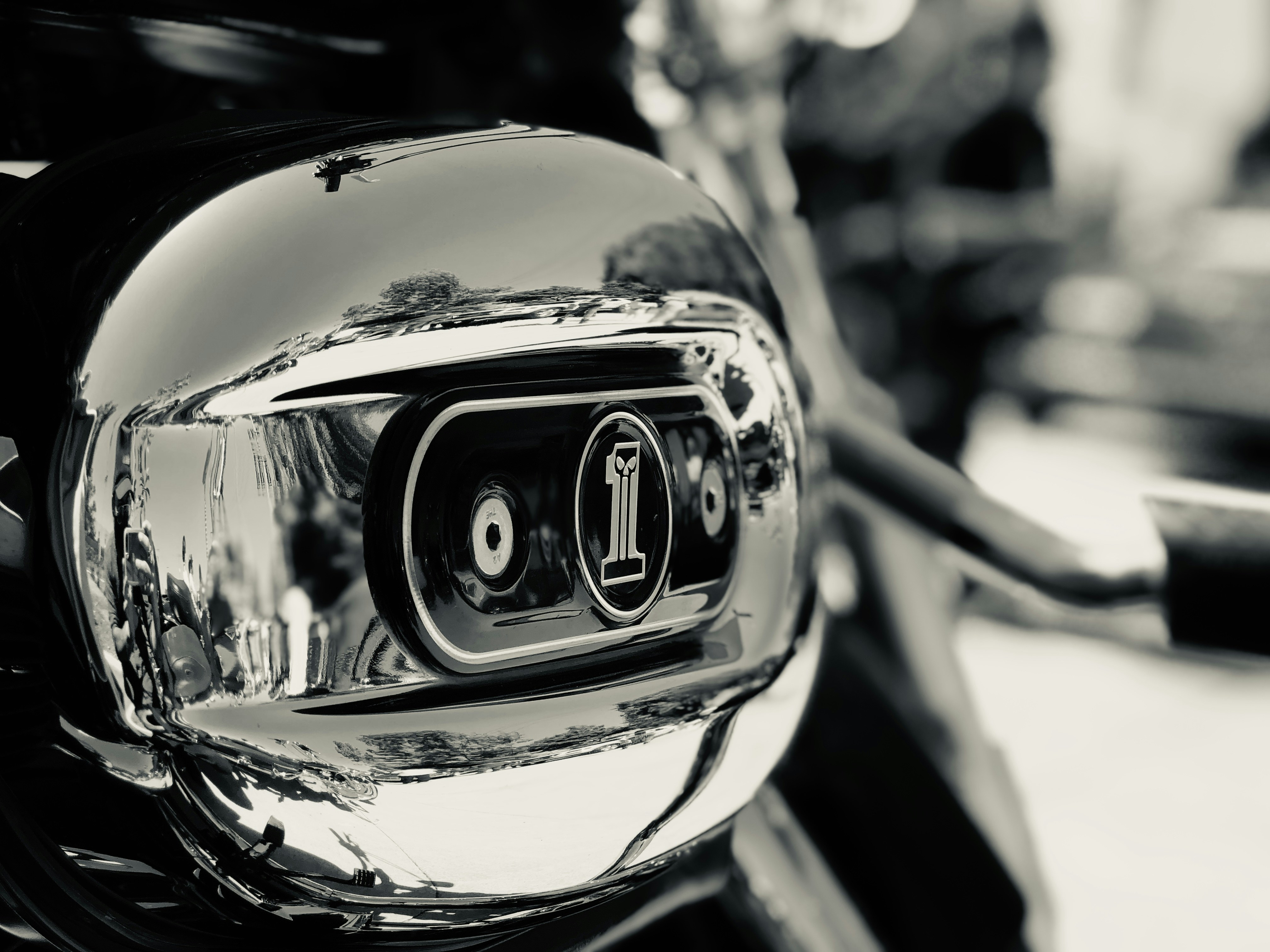 a close up of a motorcycle mirror on a motorcycle