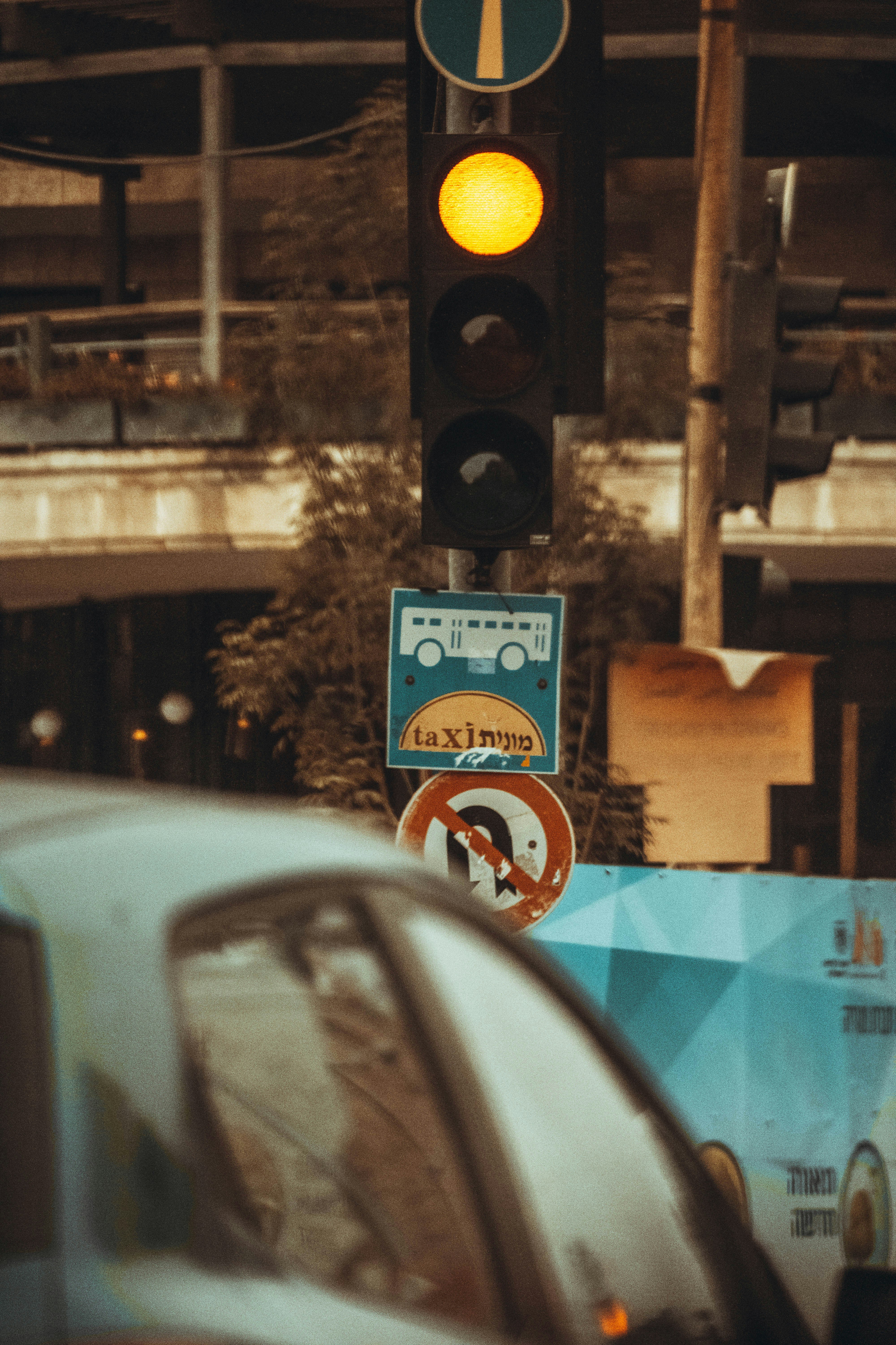 a traffic light that has a sign on it