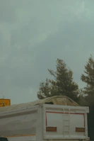 A box truck loaded and prepared for a large event logistics run under a cloudy Chicago sky.