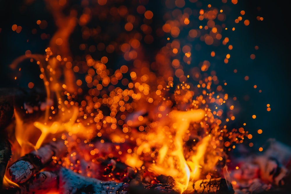 a close up of a fire with bright lights