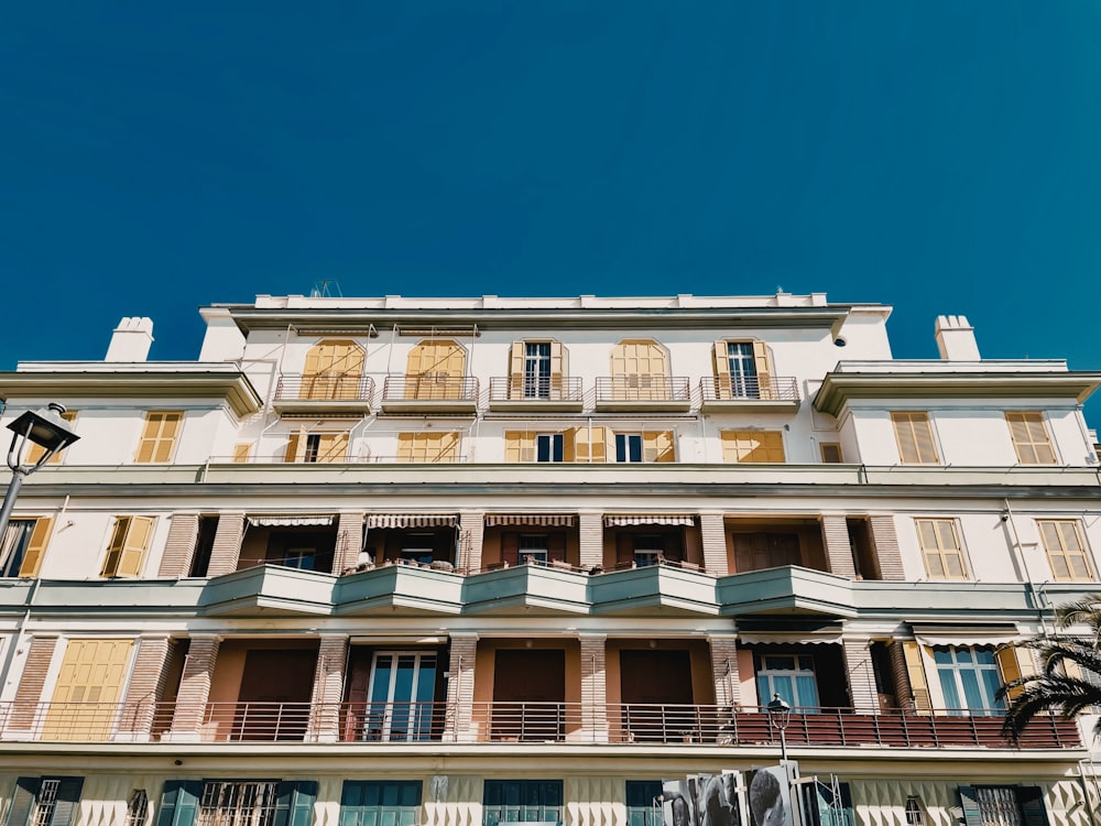 a tall building with balconies and balconies on the balconies