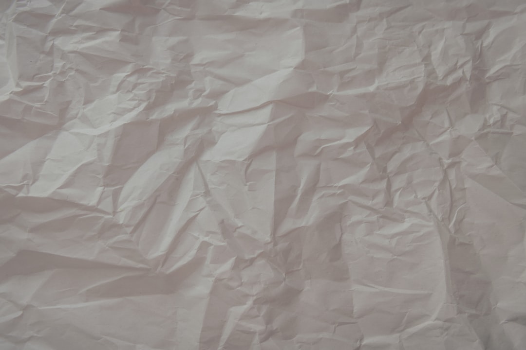 a piece of white paper that has been wrinkled, Crinkled Paper Texture