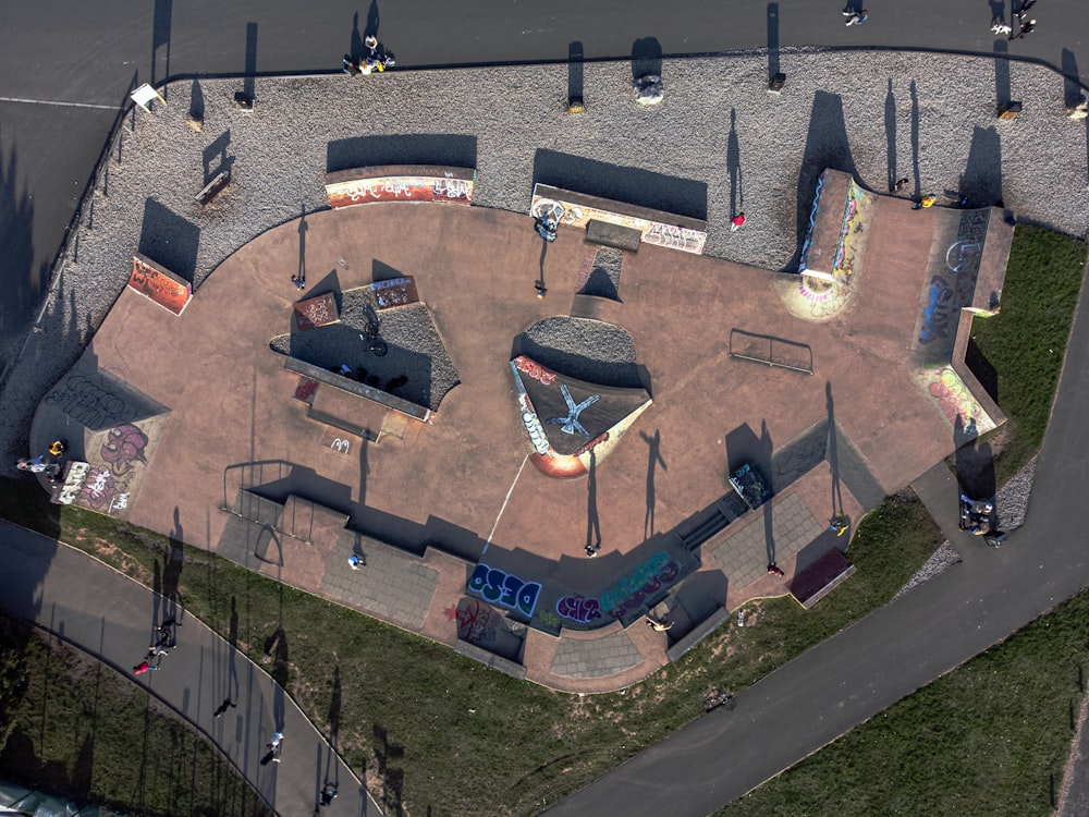 an aerial view of a skate park with ramps and ramps