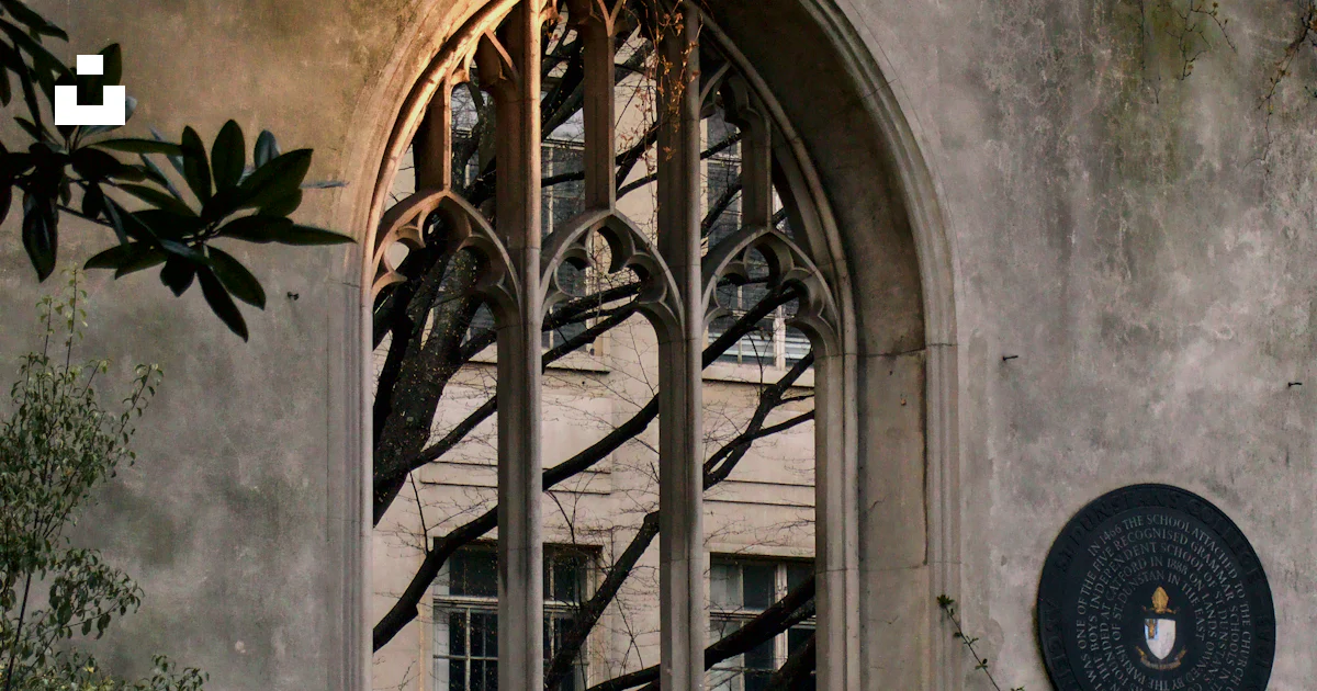 Clock Windows Building A building with a window and a clock on it photo – Free Architecture ...