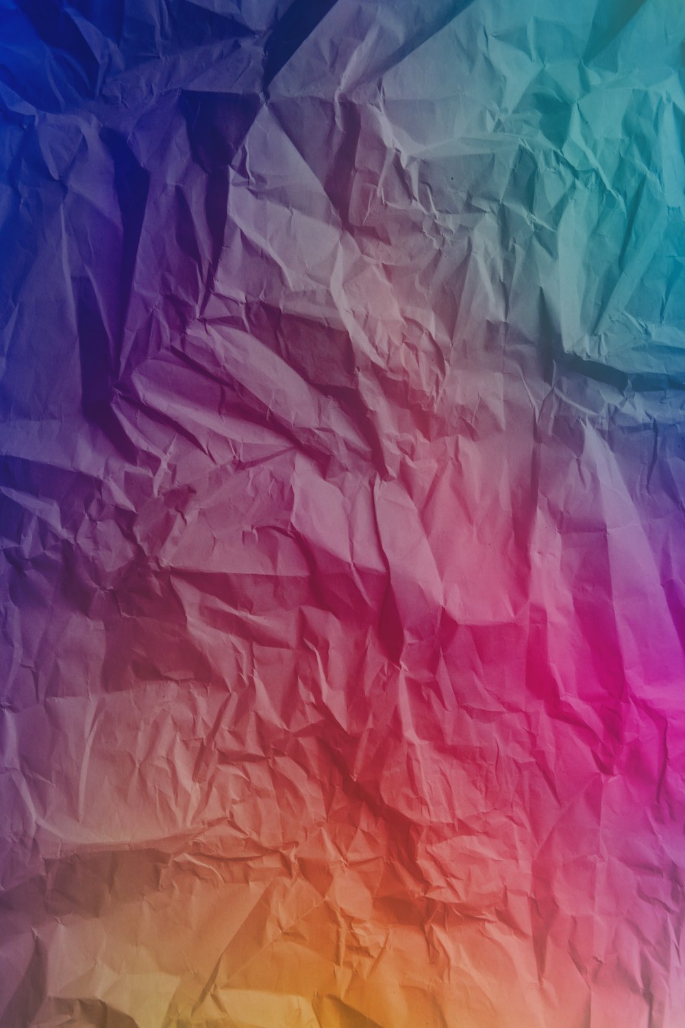 ein mehrfarbiger Hintergrund aus zerknittertem Papier