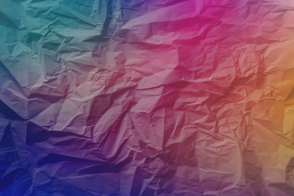 a multicolored background of crumpled paper