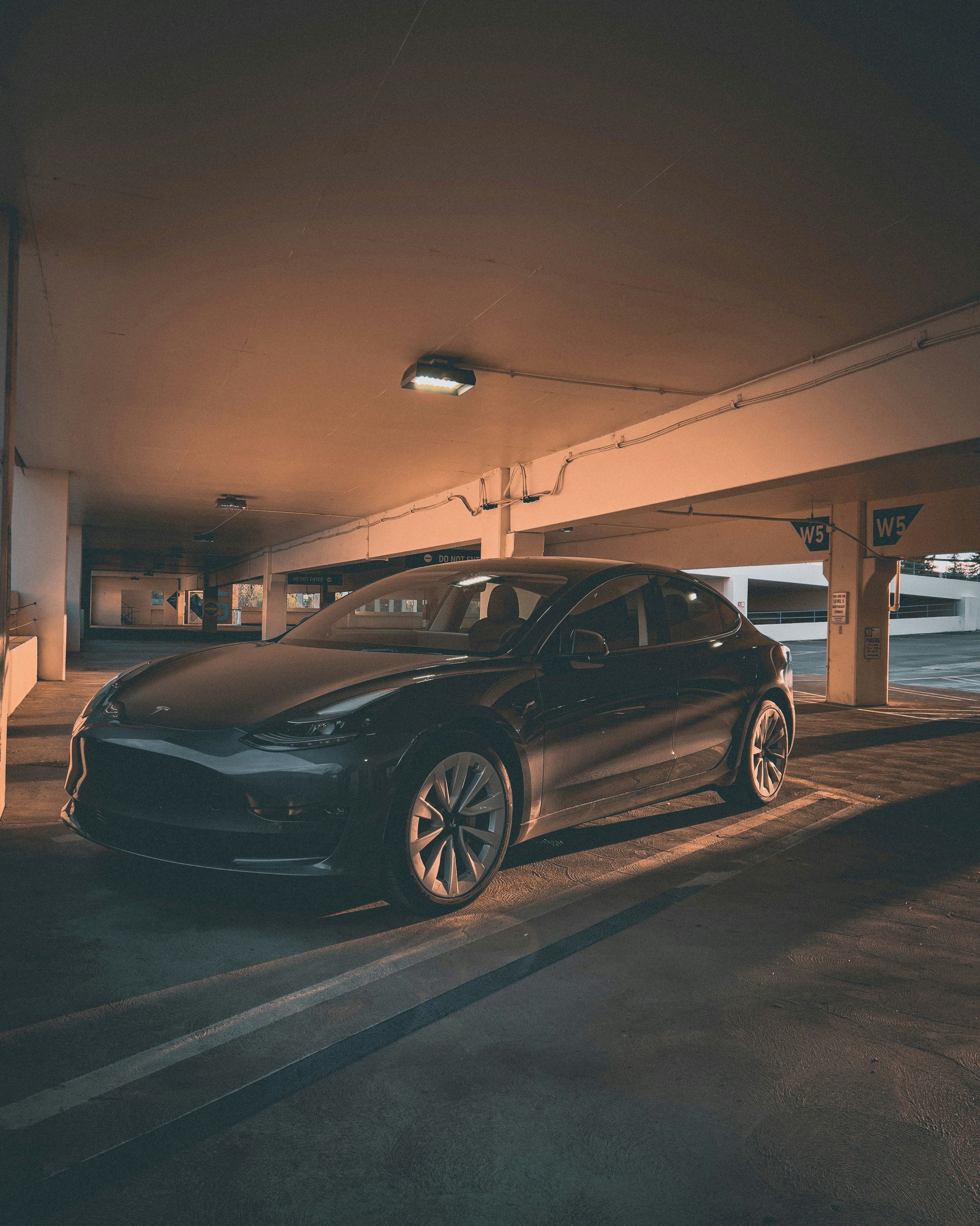 a car is parked in a parking garage