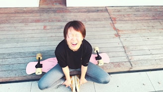 A vibrant illustration of a skateboarder laughing while coloring in a quirky comic-style book.