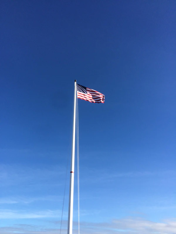 Flag and boat on the water near Mount Pleasant
