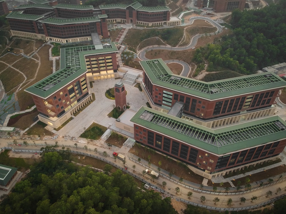 an aerial view of a building with a green roof