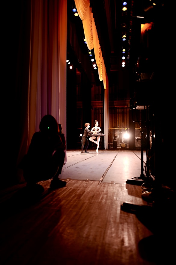 a person taking a picture of a person in a dark room