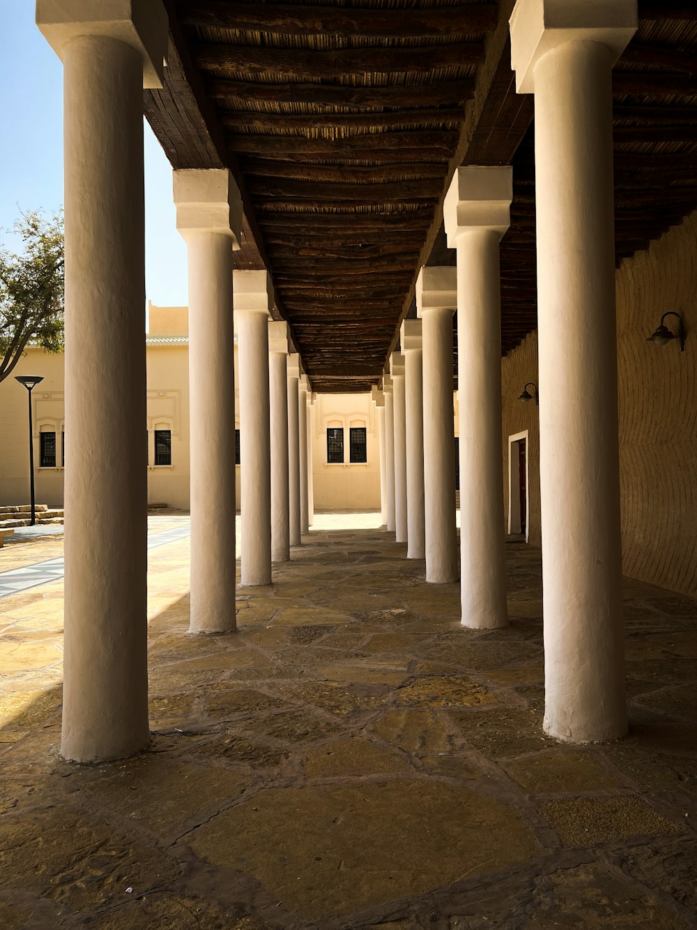 a row of white pillars sitting next to each other