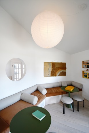 a living room with a couch and a table