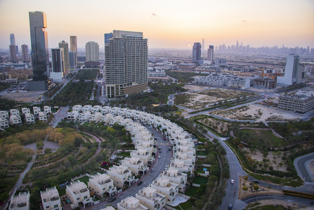 an aerial view of a city with lots of tall buildings