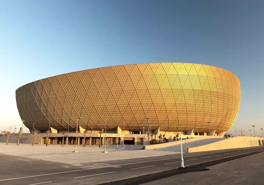 a large building with a large circular structure on top of it