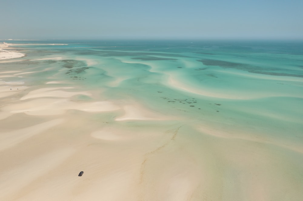 a bird's eye view of a sandy beach