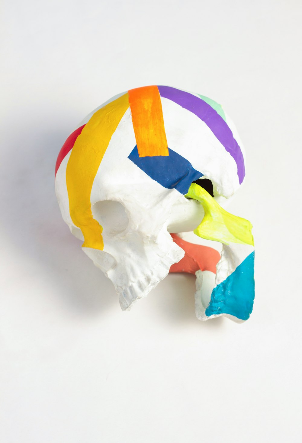 a multicolored skull on a white background