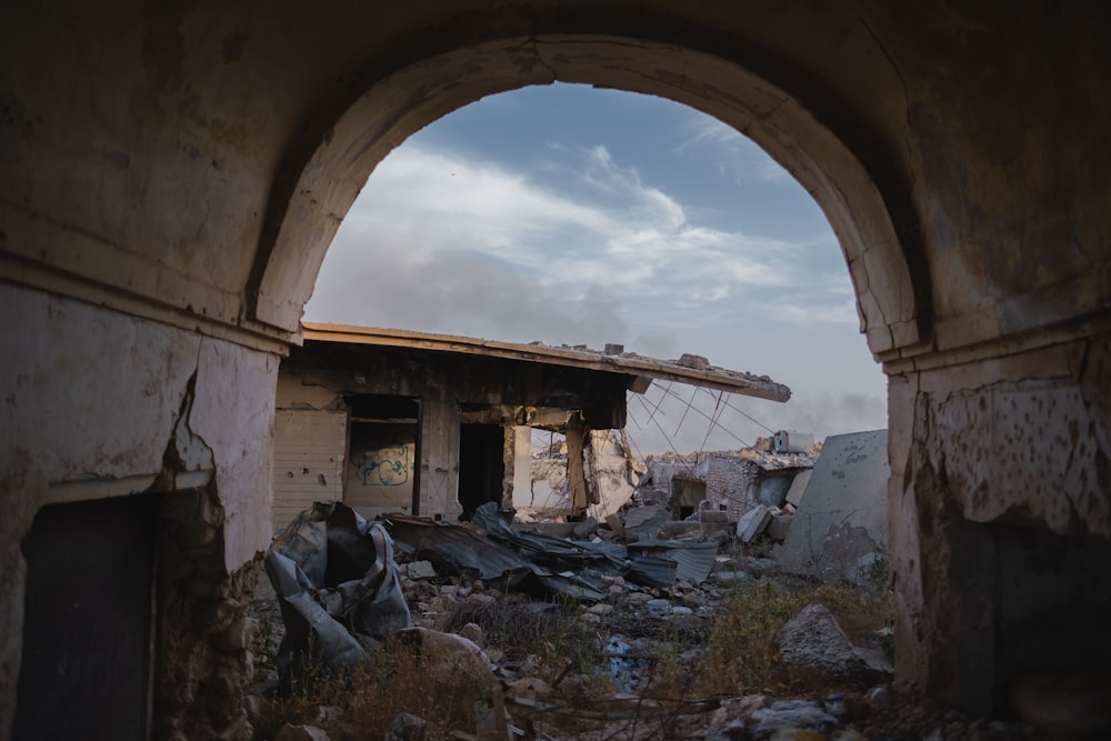 a destroyed building with a hole in the middle of it