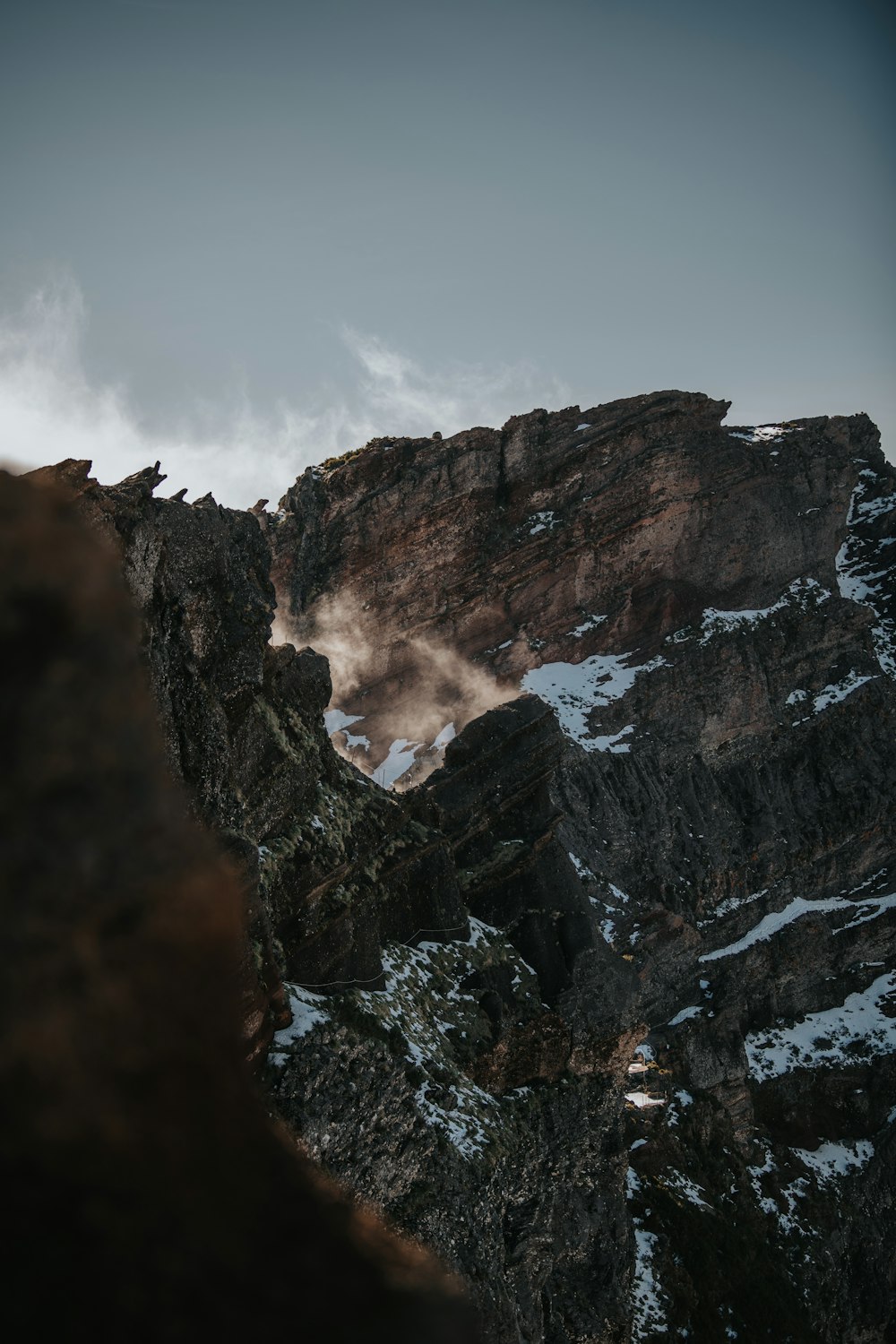 a mountain with snow on the top of it