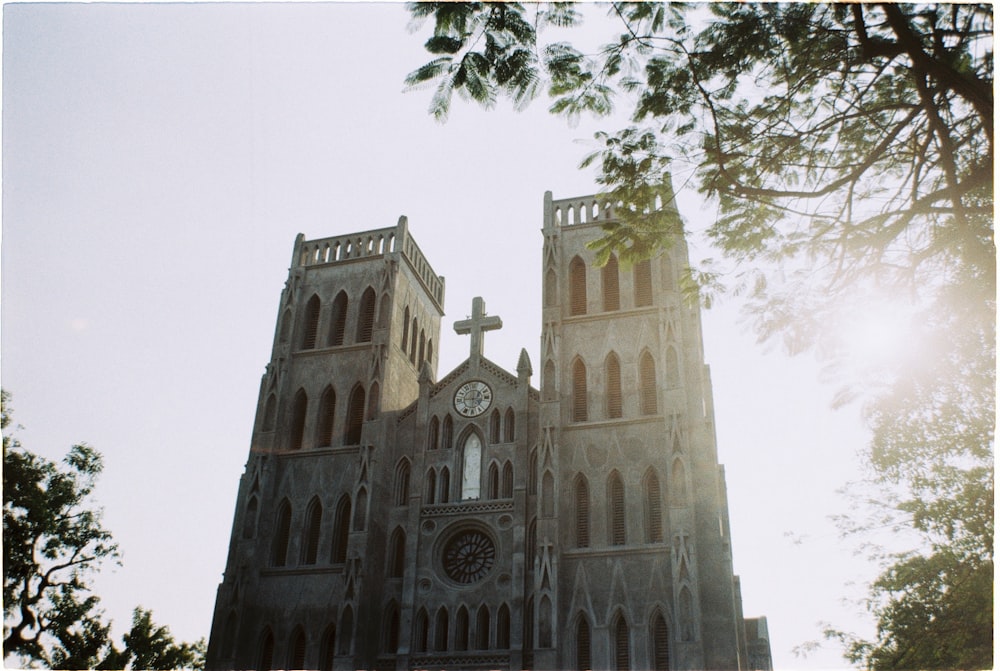 a large cathedral with a clock on the front of it