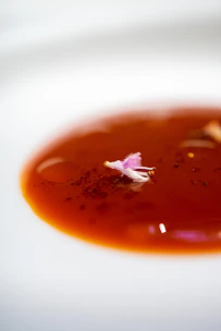 High-quality image of mie dahanon original served with signature red sauce