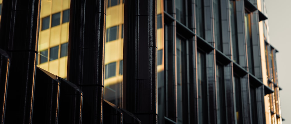 a tall building with lots of windows next to a traffic light