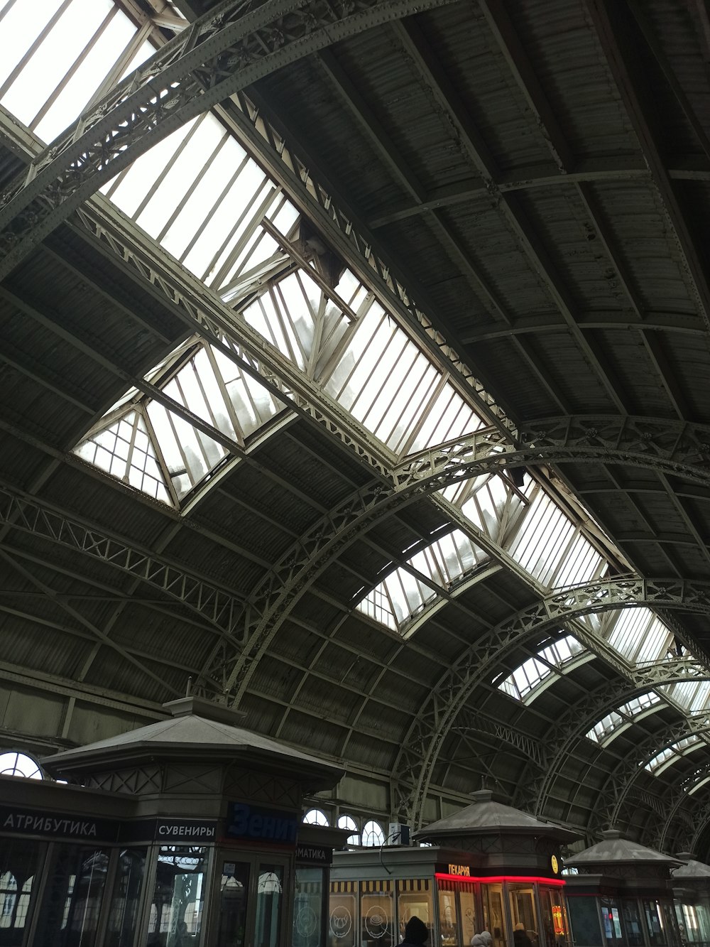 a train station with a skylight above it