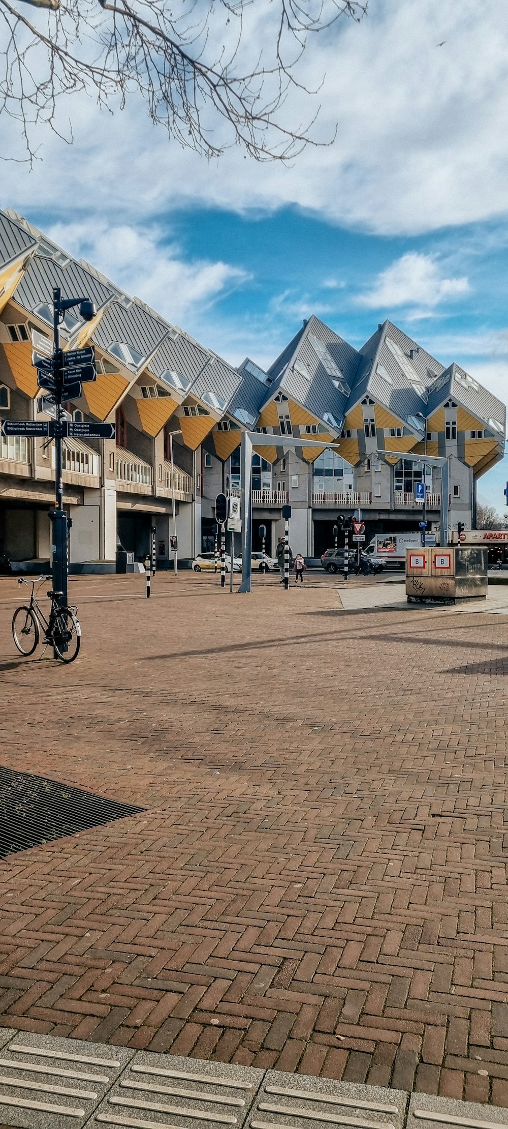 a row of buildings with a bicycle parked in front of them