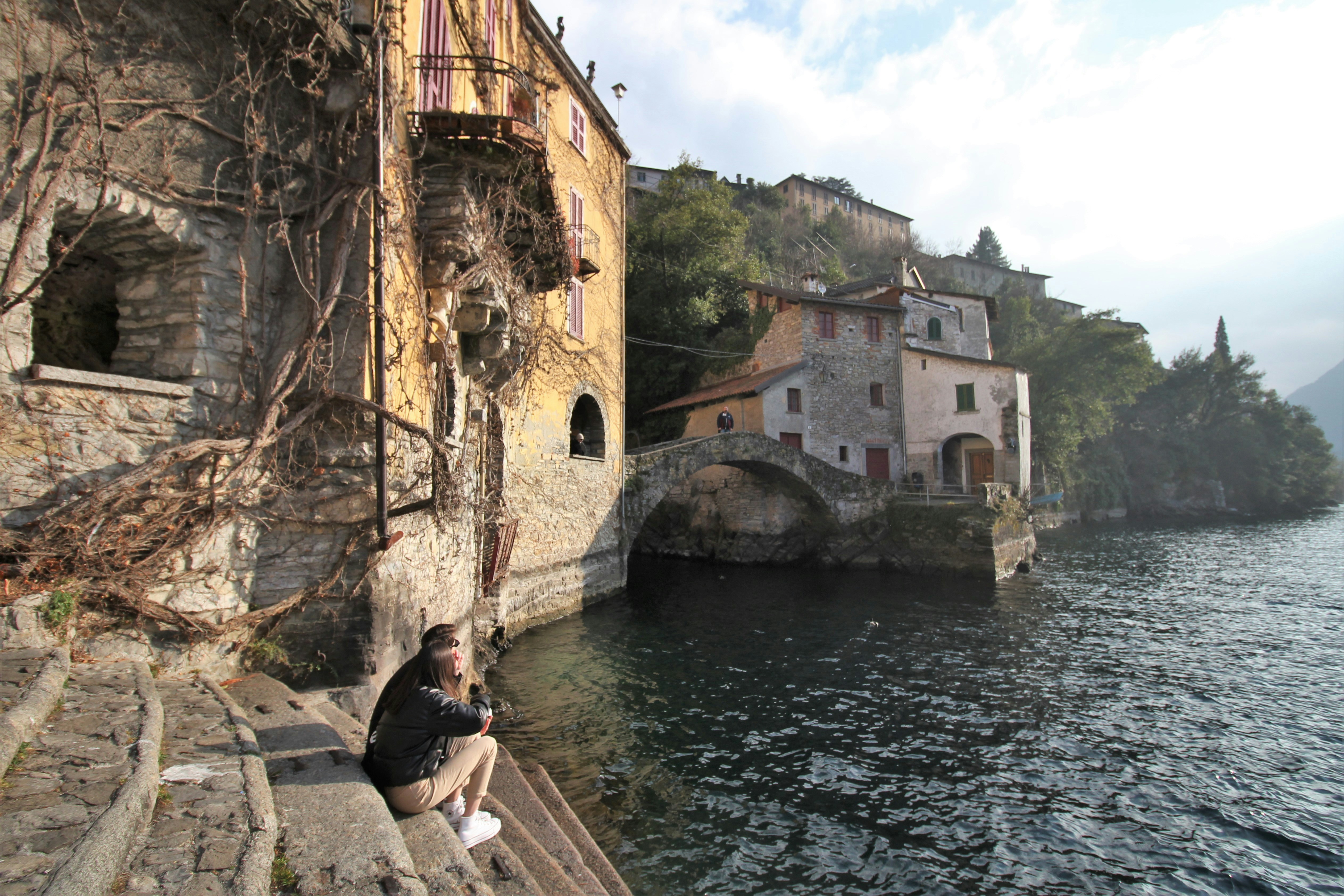 A dramatic view of the Orrido di Nesso gorge with its powerful waterfall.