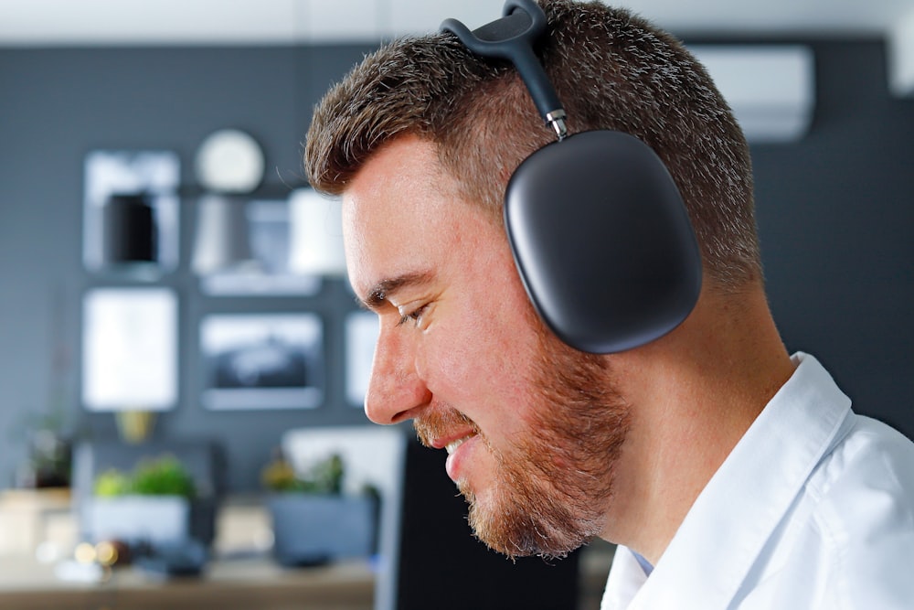 a man with a beard wearing a headset