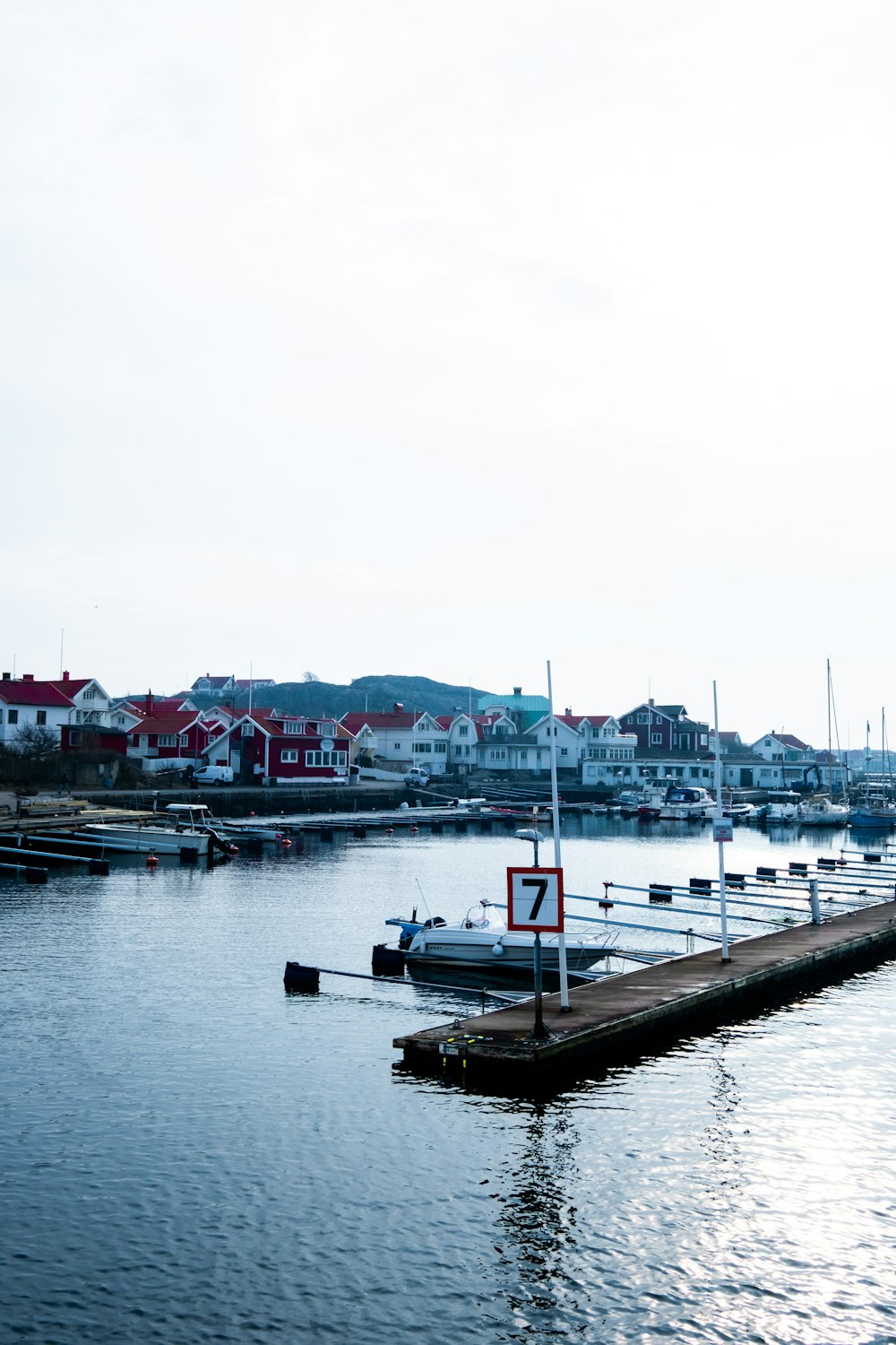 a body of water with a bunch of boats in it