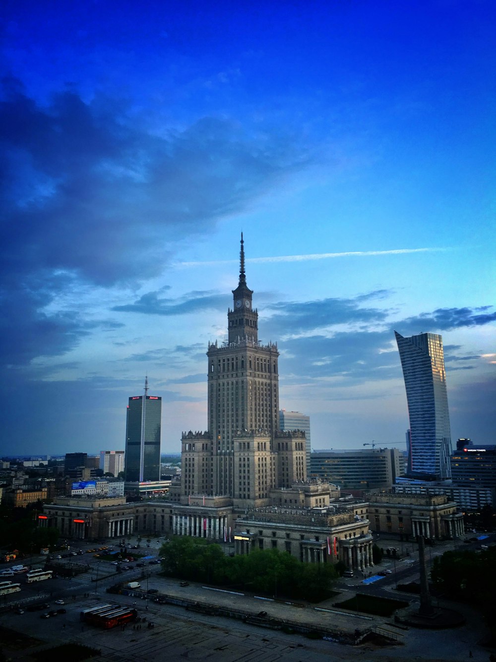 a very tall building with a sky background