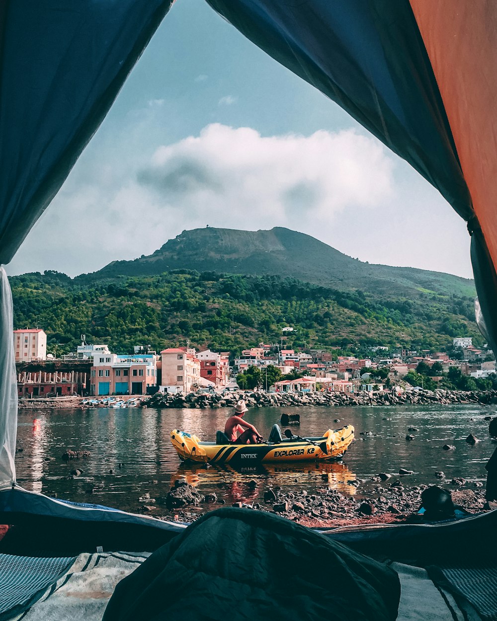 a couple of people in a boat on a river