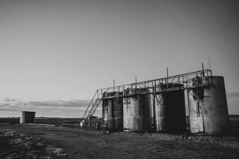 a black and white photo of a grain silo