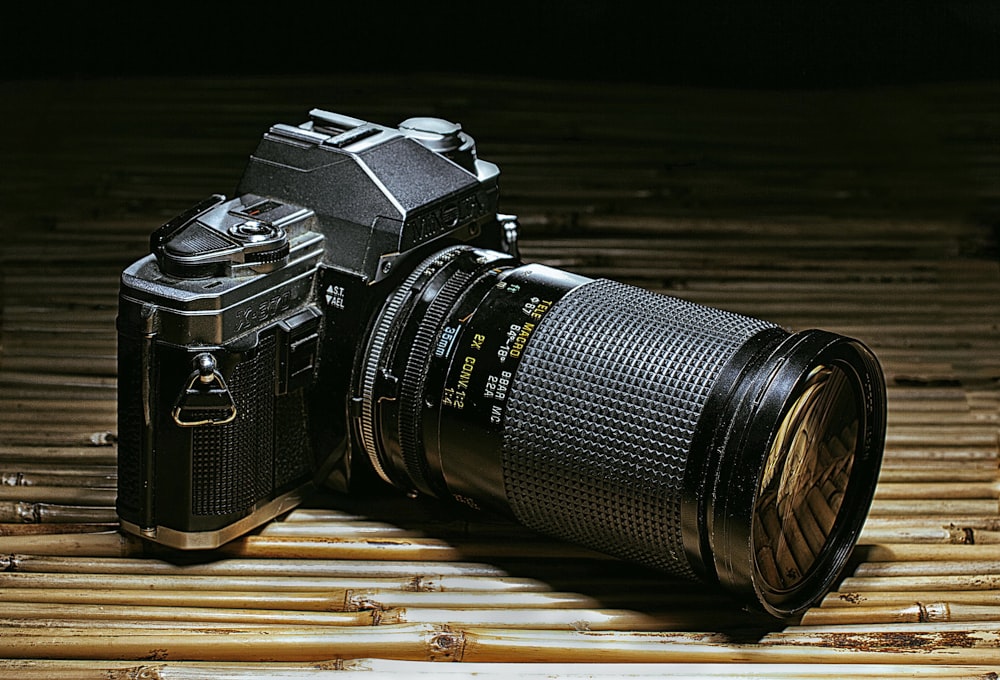 a camera sitting on top of a bamboo mat