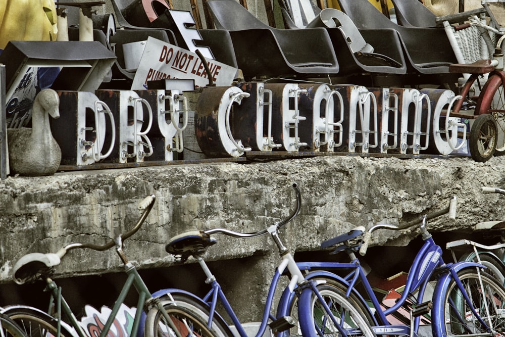 a bunch of bikes parked next to each other