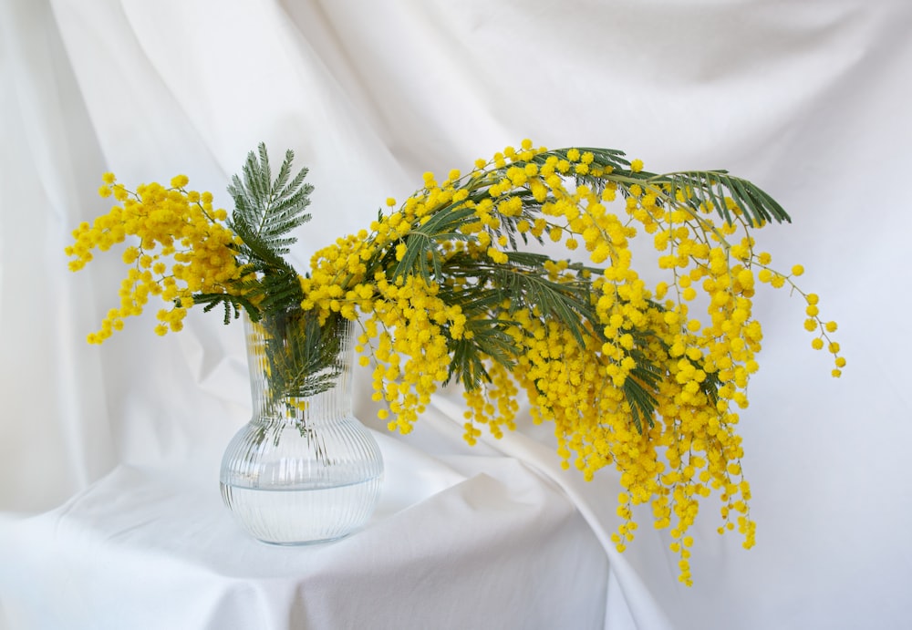 a vase of flowers on a table