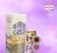 A saffron packaging design featuring a large rectangular box and a smaller round container. The background is a soft gradient of pinks and purples. The packaging is adorned with floral imagery and intricate geometric patterns in shades of blue and gold. The brand name 'ATIGH SAFFRON' is prominently displayed along with a decorative logo.