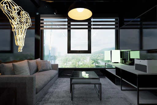 a living room with a couch a table and a window