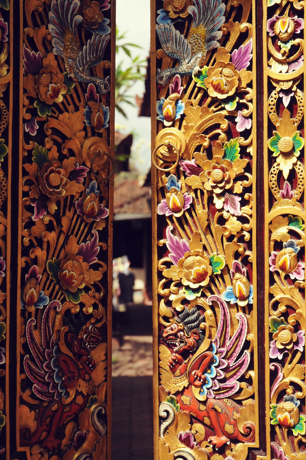 a close up of a decorative wooden door