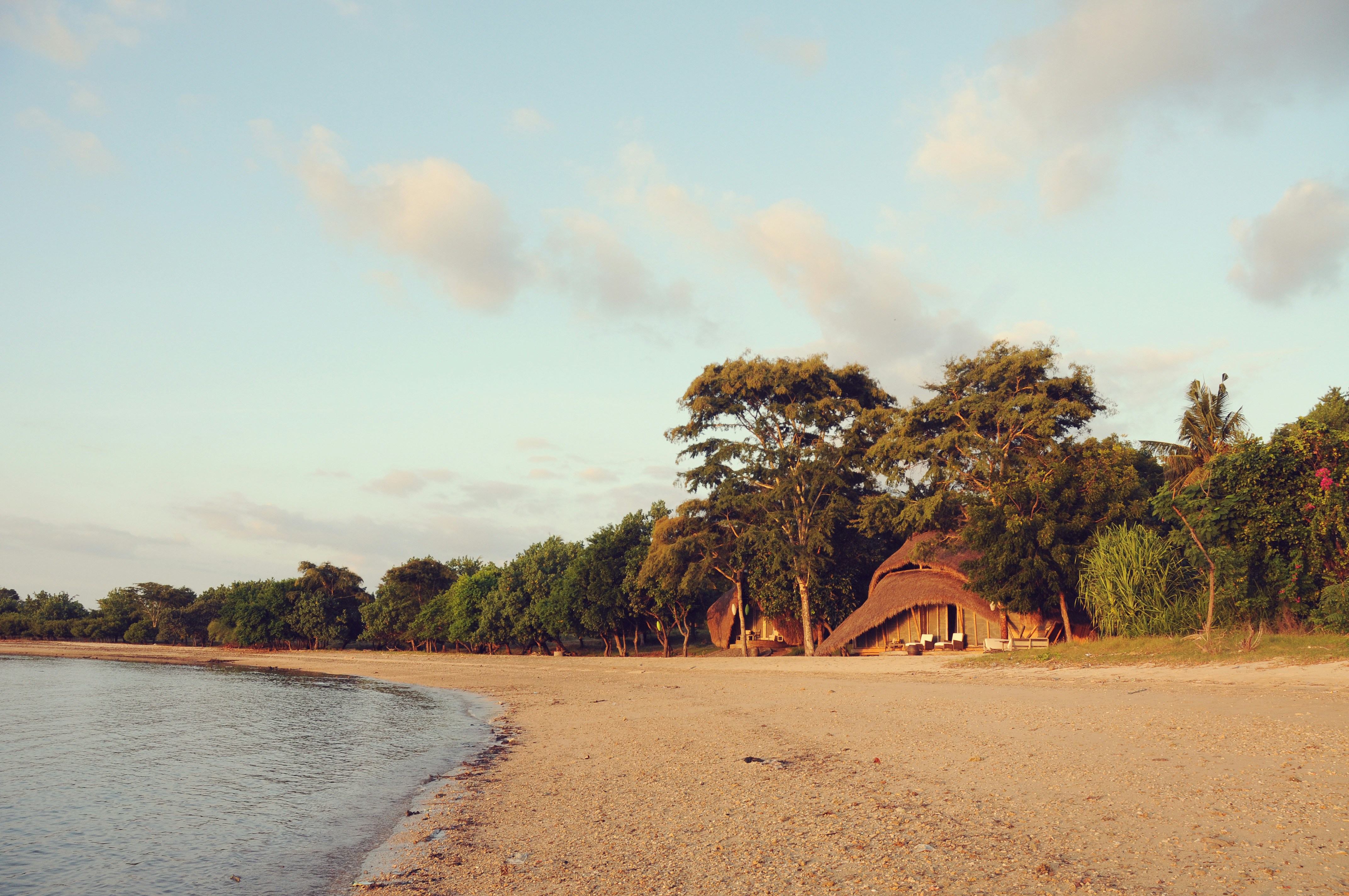a house on the shore of a lake