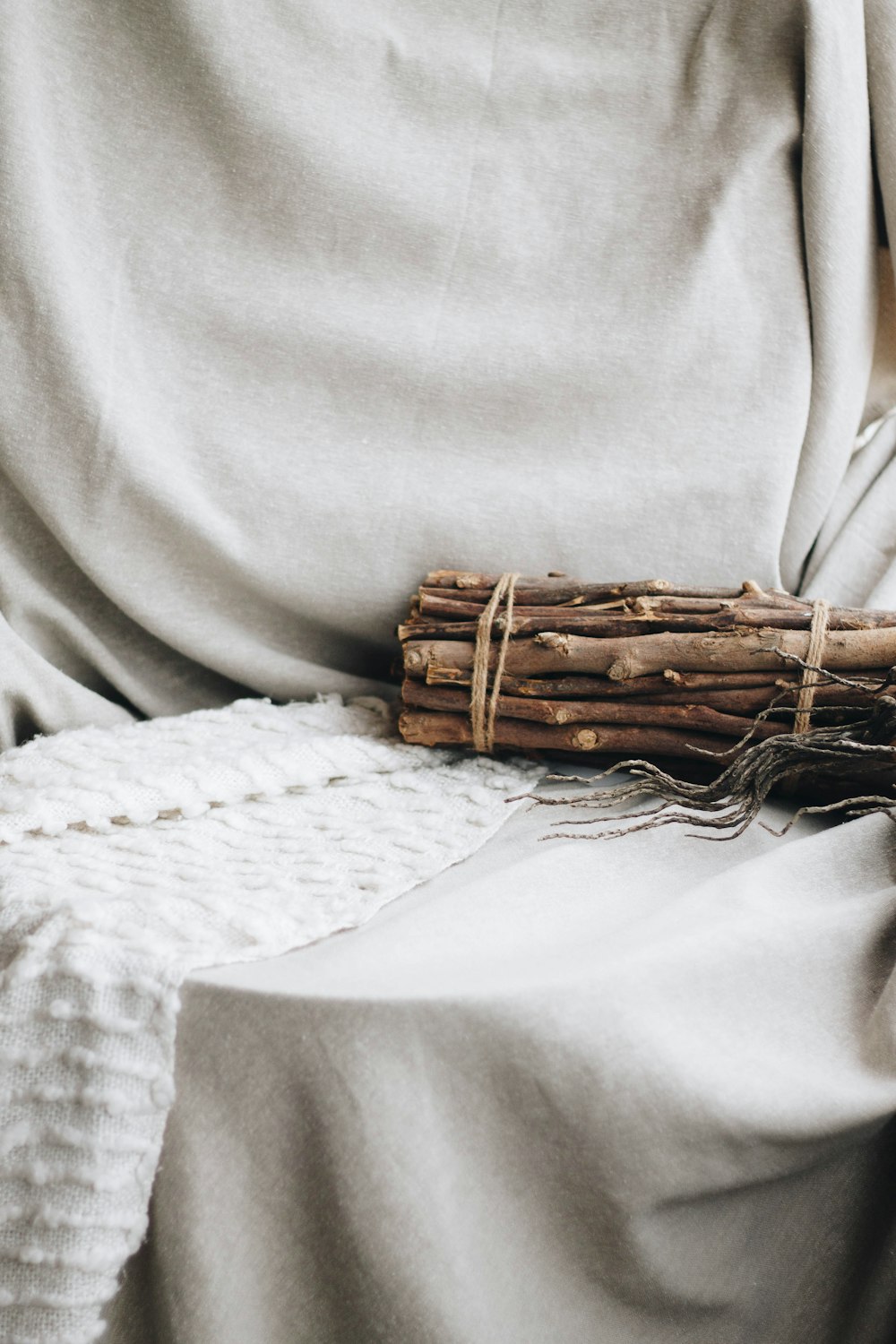 a close up of a person wrapped in a blanket